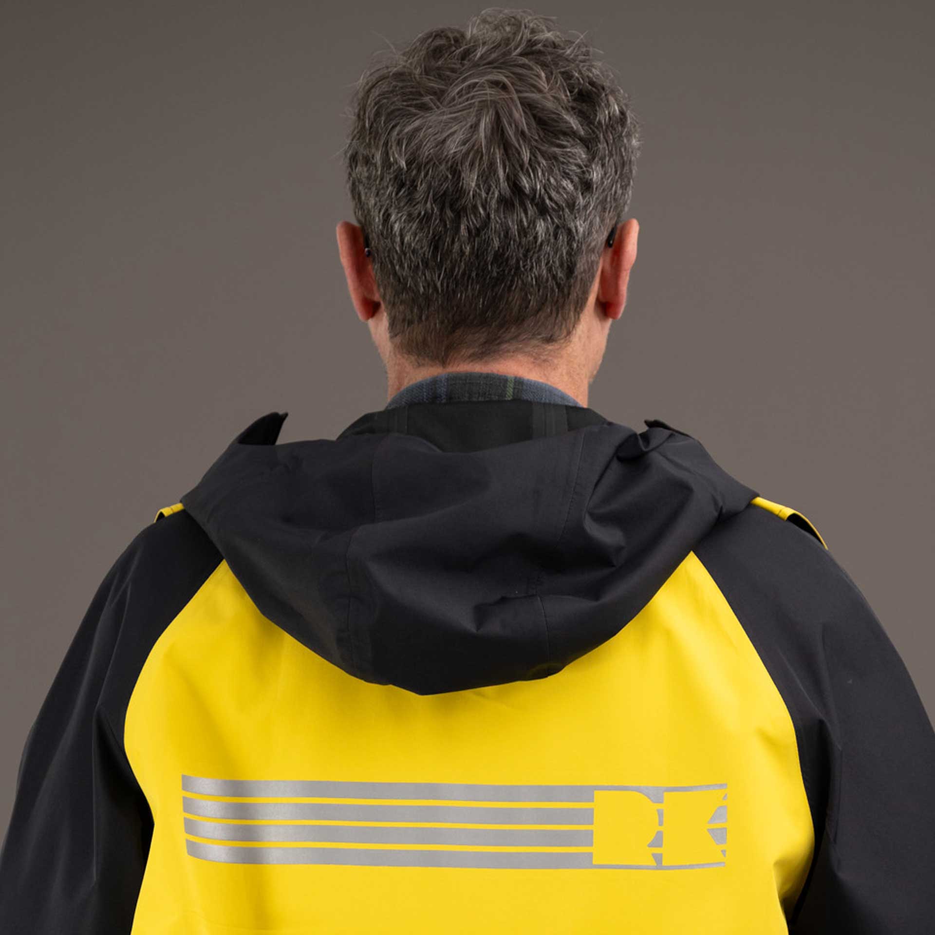 détail dos parka bicolore rekis homme visibilité vélo